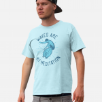 Man standing and wearing a sky blue Swellone tshirt.