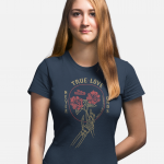 Woman wearing an ocean blue Swellone tshirt with true love logo.