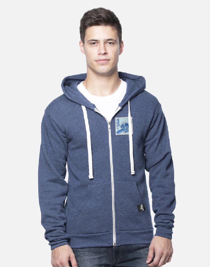 Man wearing an ocean blue zip up Swellone sweatshirt.