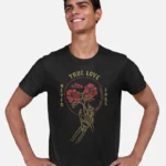 Man wearing a black Swellone tshirt with true love logo.